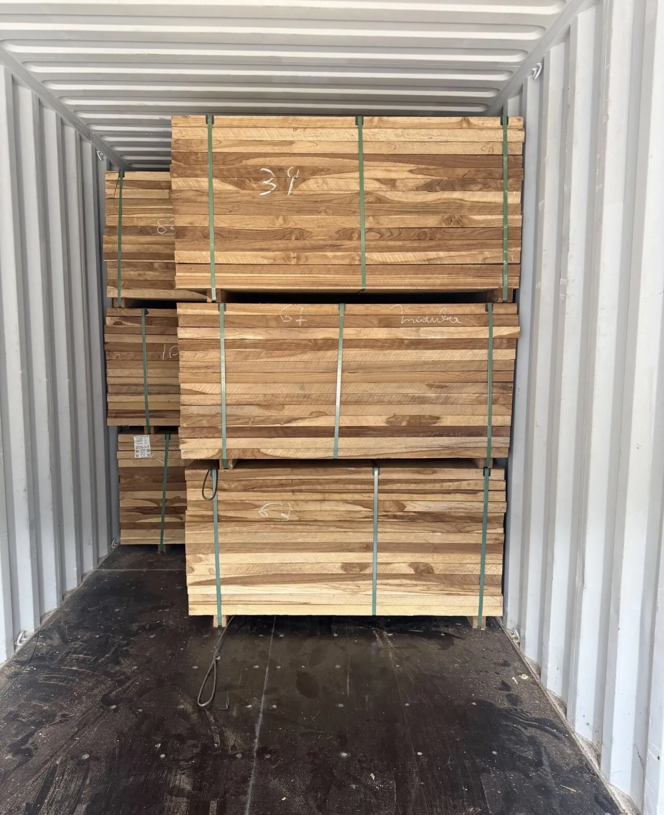Teak boards loaded in shipping container